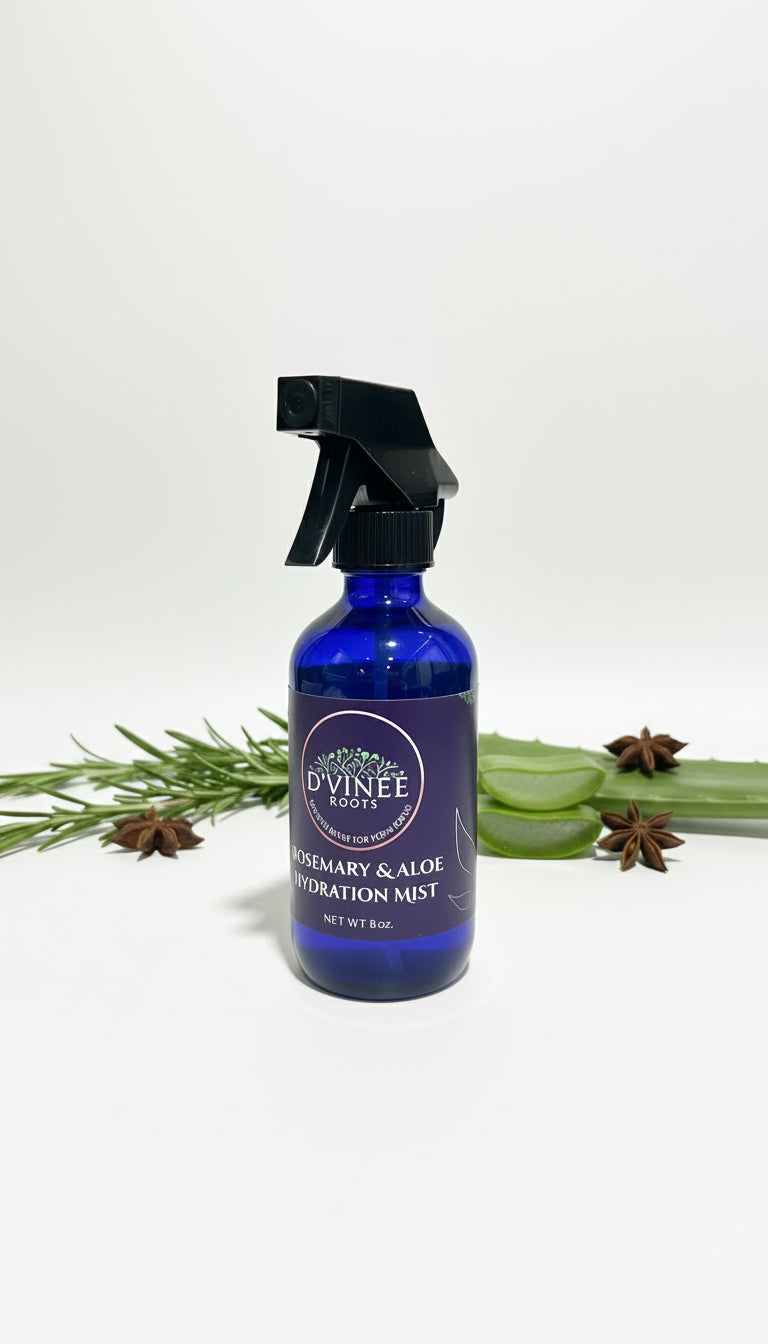 Blue spray bottle with black nozzle on a white surface