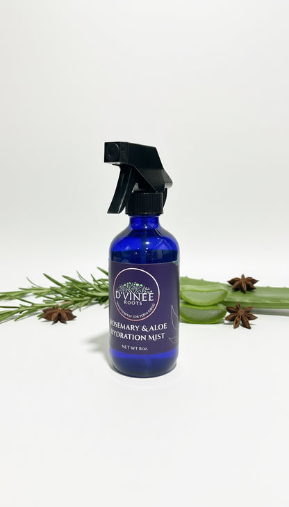 Blue spray bottle with black nozzle on a white surface